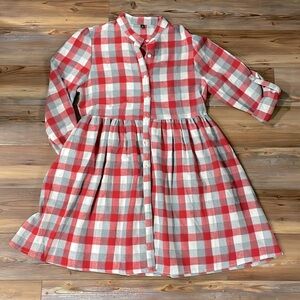 Women’s Plaid Flannel Button Up Pleated Dress with Pockets and roll up sleeves.